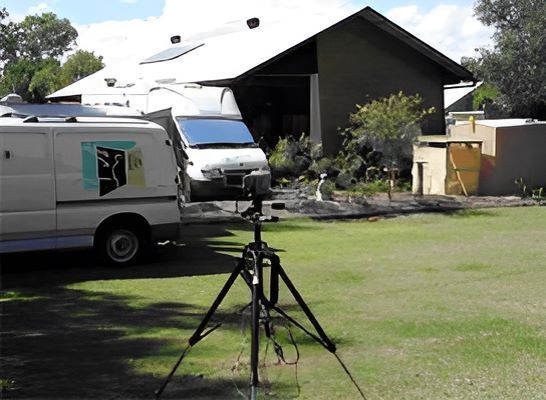 A White Van is Parked in Front of a House — Vent Wise in Twin Waters, QLD