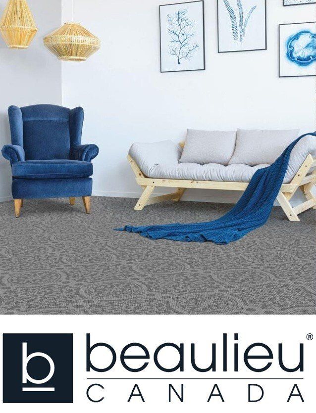 A living room with a couch and chair by beaulieu canada