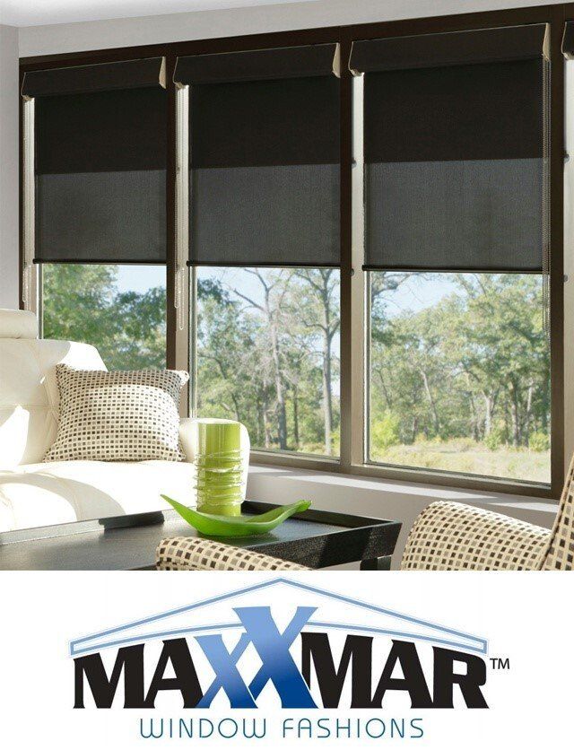 A living room with a logo for maxmar window fashions