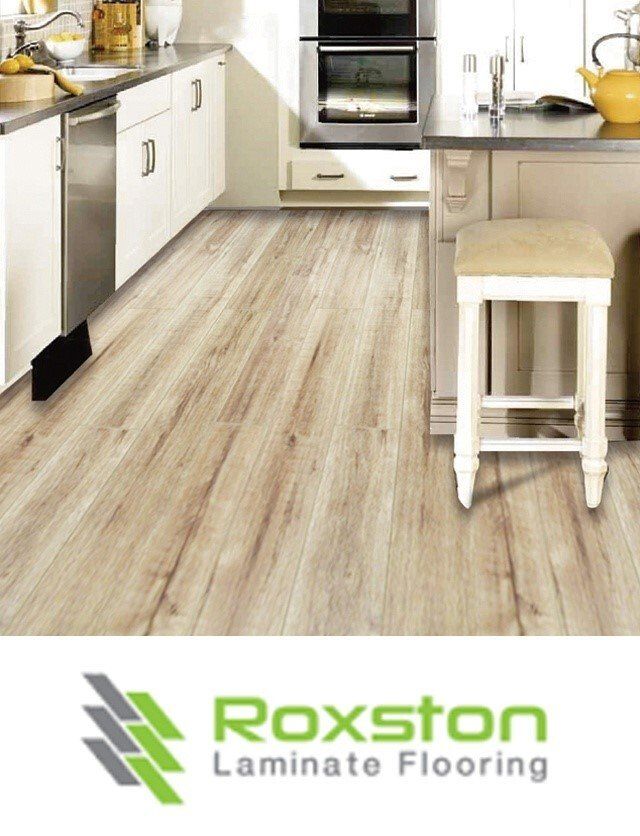An ad for roxston laminate flooring shows a kitchen