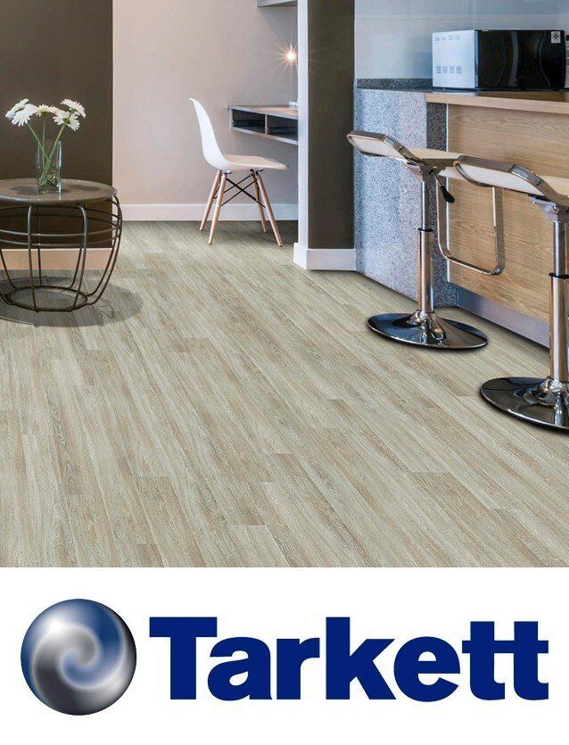 A picture of a kitchen with a tarkett logo