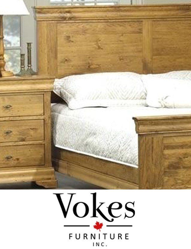 A picture of a wooden bed with the words 