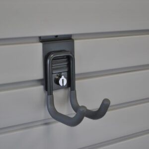 A close up of a hook on a wall.