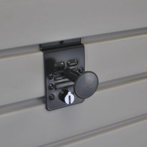 A close up of a lock on a wall.