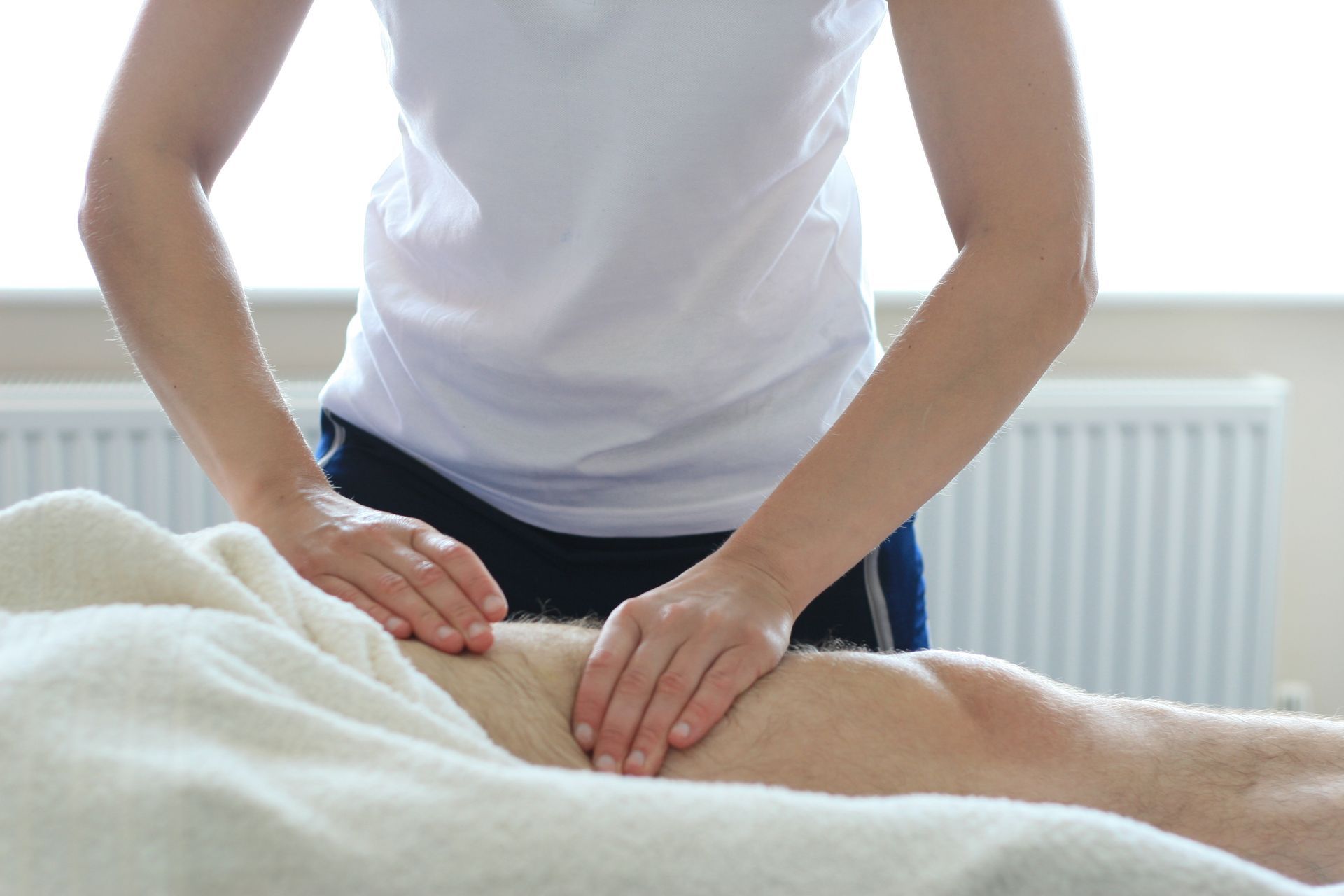 physiotherapist providing massage