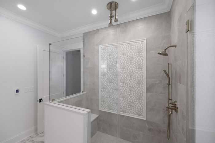 homearama 2020 custom home by joe kroll builder in Louisville Kentucky master bathroom walk-in shower with rainfall shower head feature