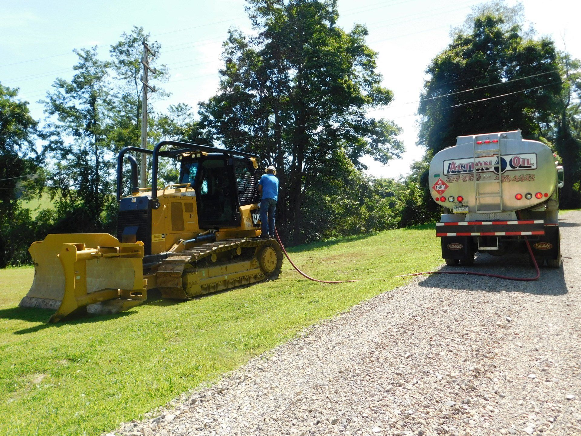 A Bulldozer Is Being Fueled By A Tanker — Dunbar, PA — Action Oil