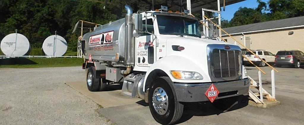 Truck Is Parked In Front Of A Building — Dunbar, PA — Action Oil