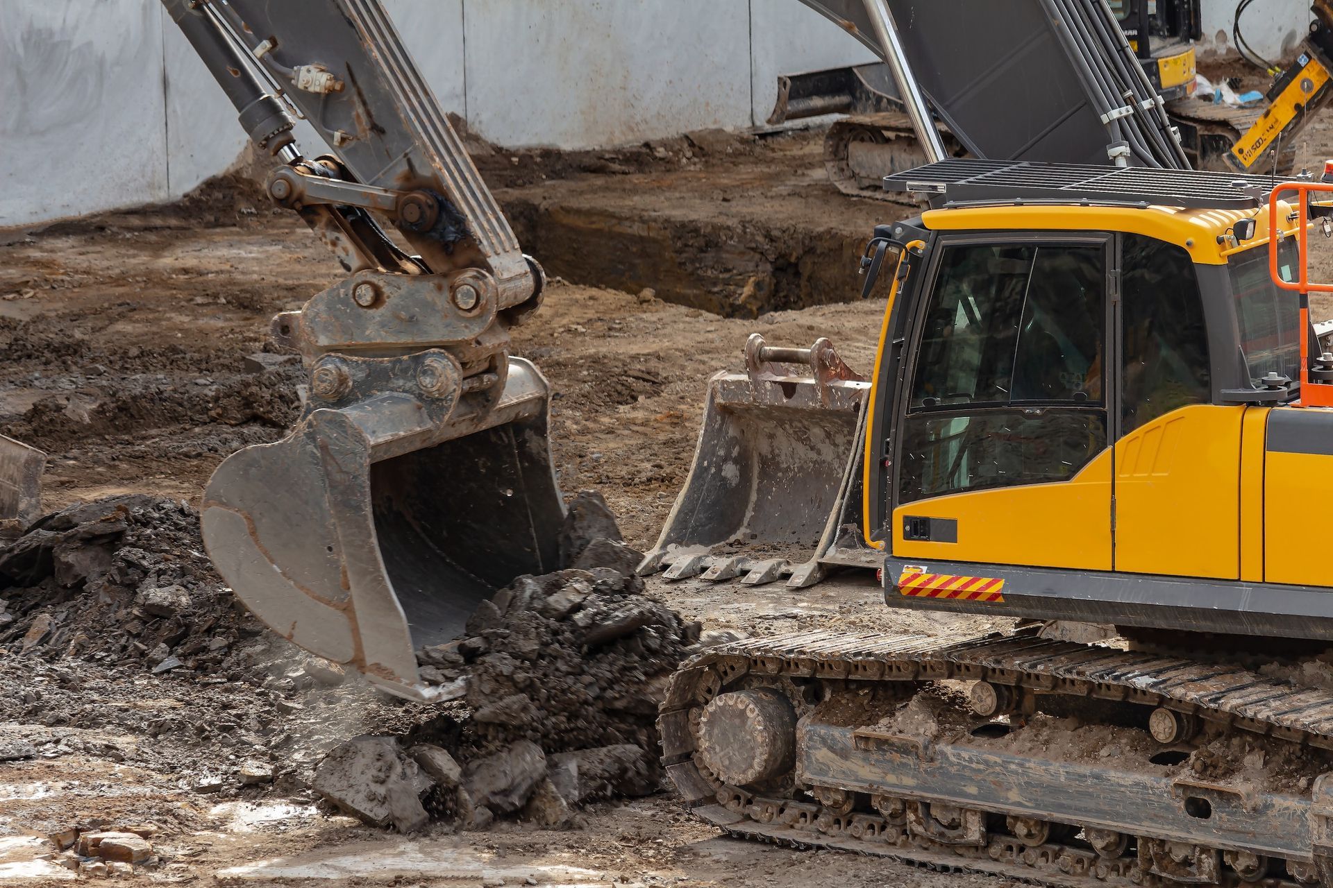Yellow And Black Excavator On Soil