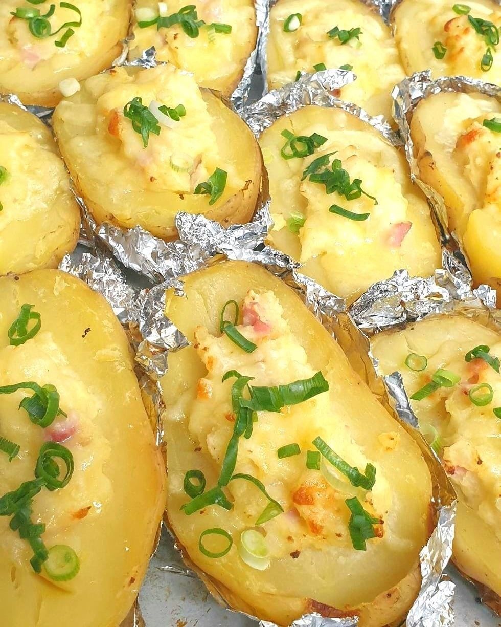 Baked Potatoes With Creamy Filling And Green Onions — Mels Catering in Garbutt, QLD