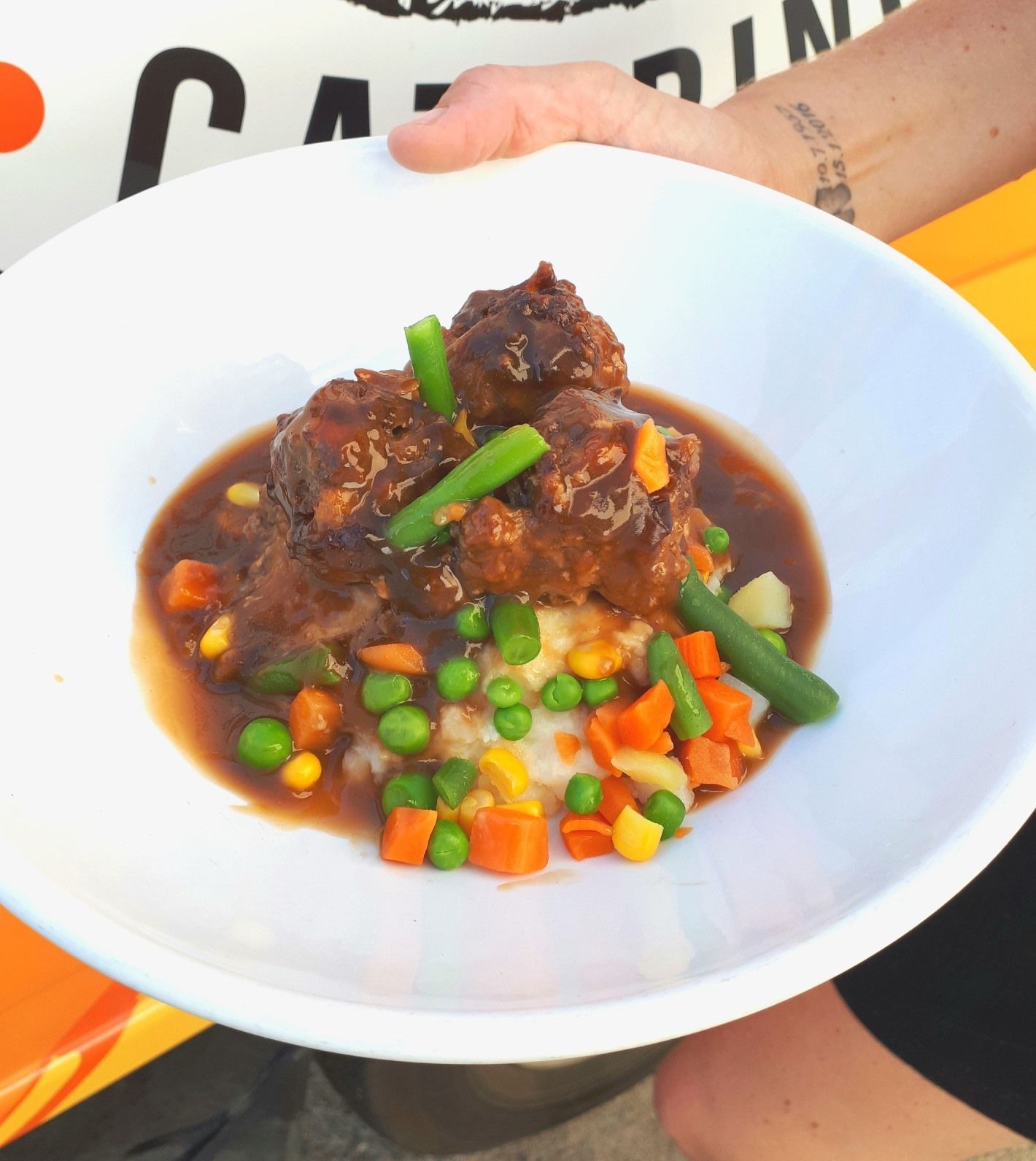 Beef Stew With Mixed Vegetables on a Bed of Mashed Potatoes — Mels Catering in Longreach, QLD