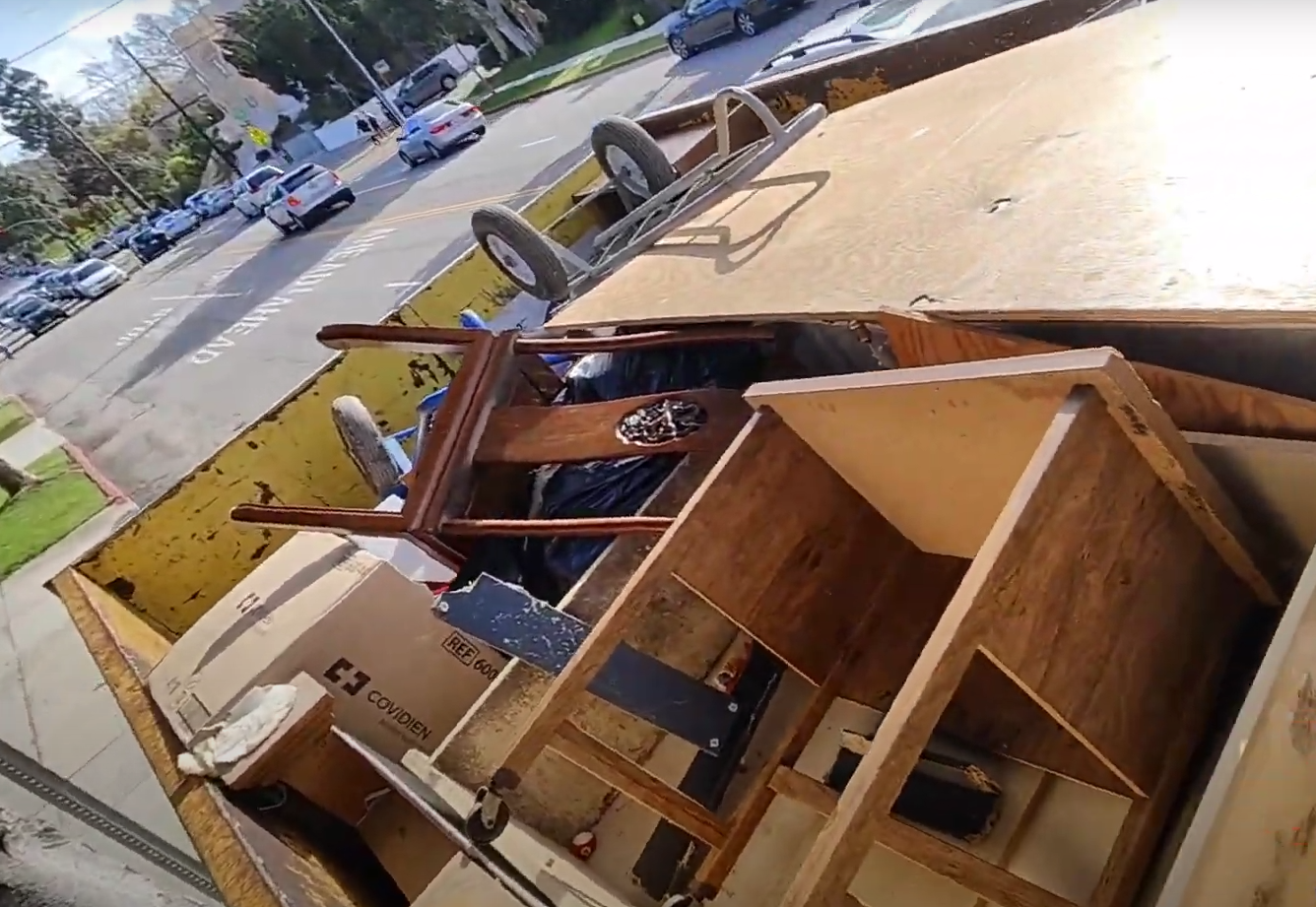 top view of large furniture like tables and chairs on truck