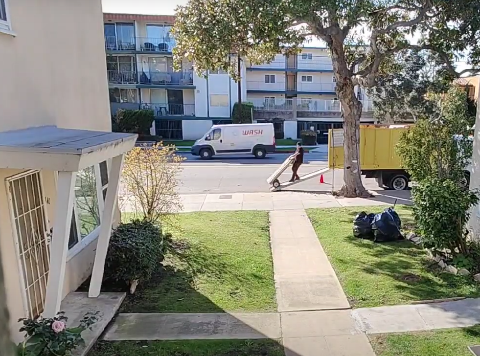 wheeling junk into our large junk hauling truck