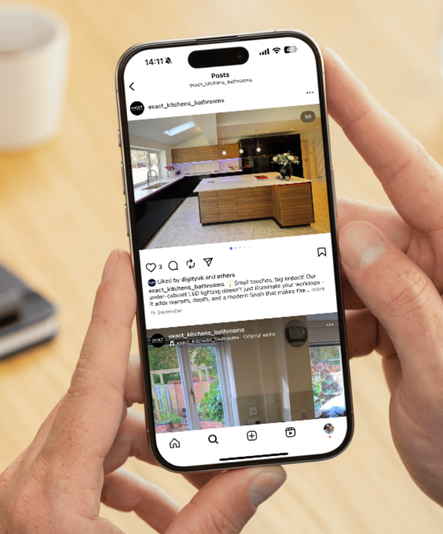 Person holding a phone displaying Instagram. Kitchen photos are visible on the screen.