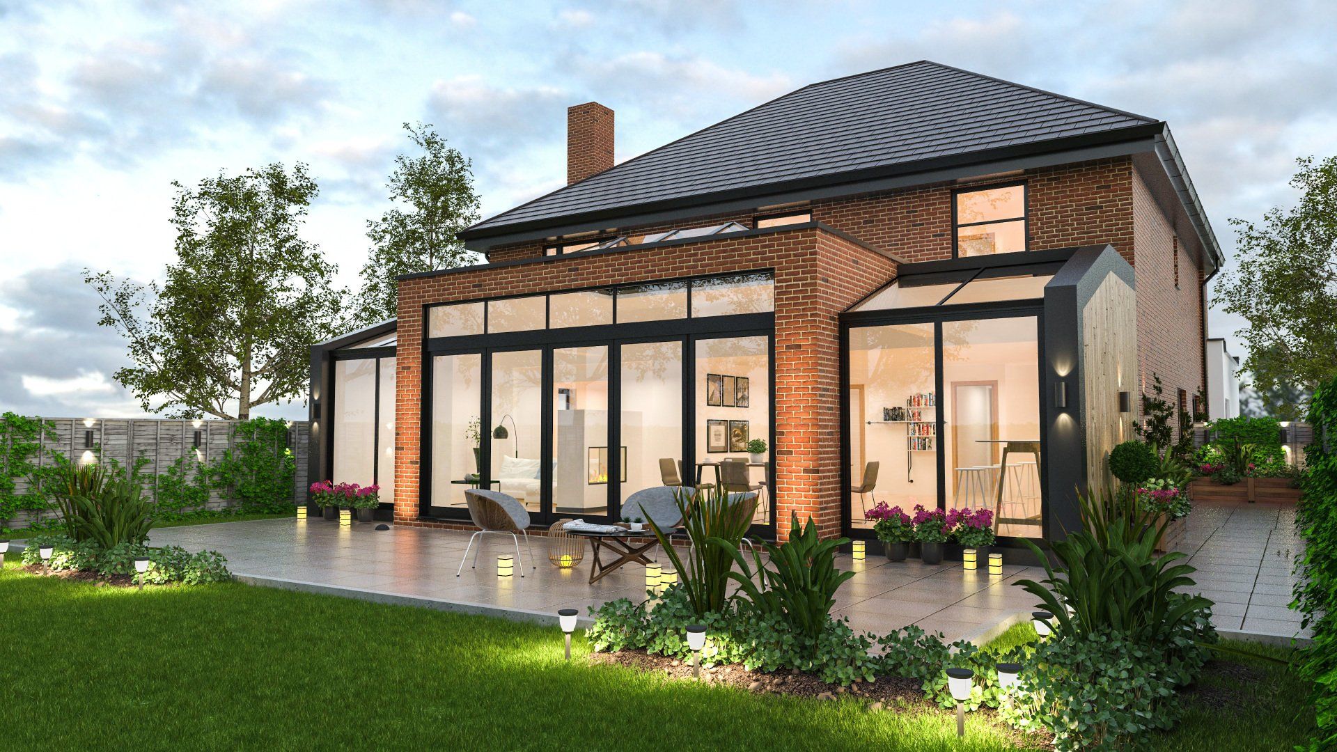 A house with a lot of windows and a patio in front of it.