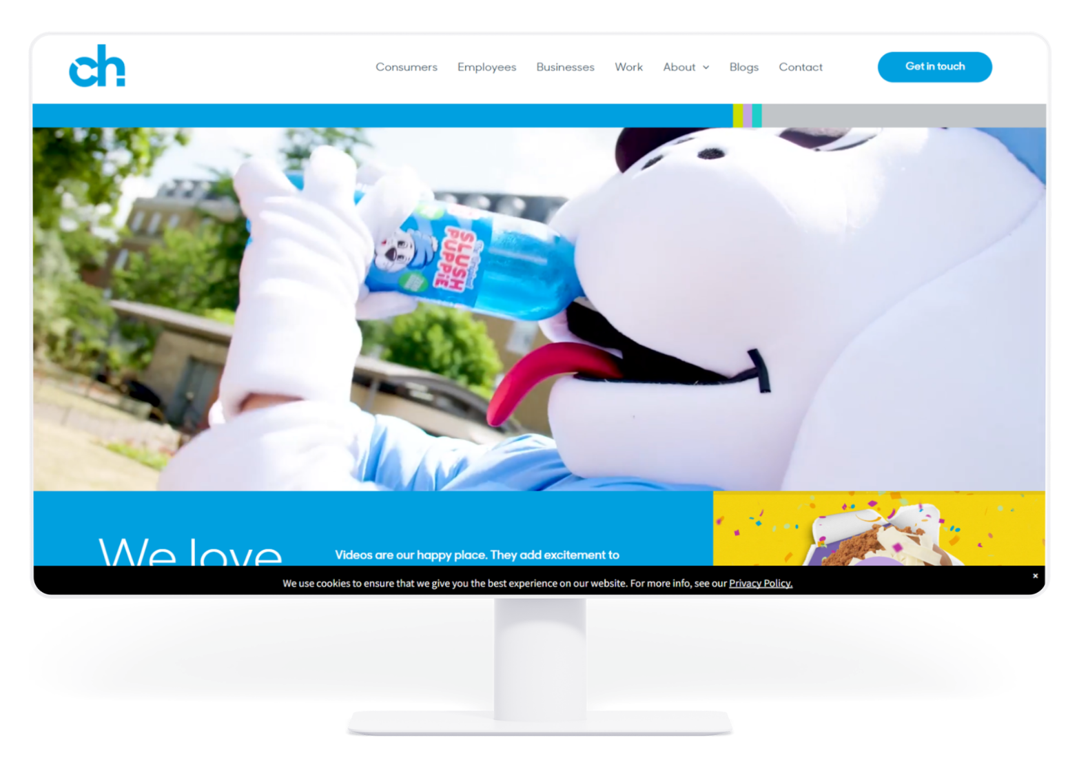 A large white mascot with a blue tongue drinking from a blue Capri-Sun pouch on a computer screen.