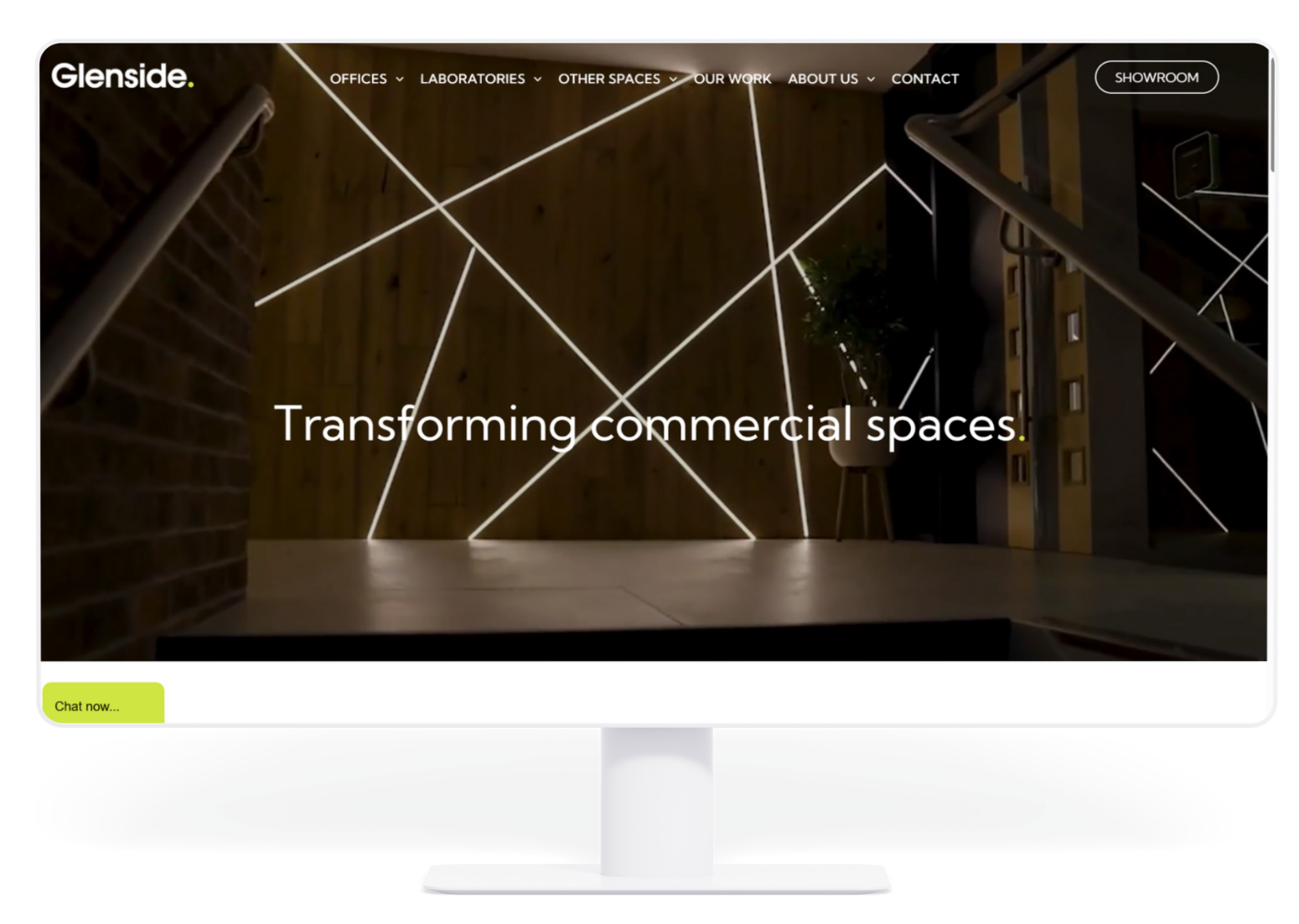 Website homepage design, interior commercial space with illuminated lines, text reads
