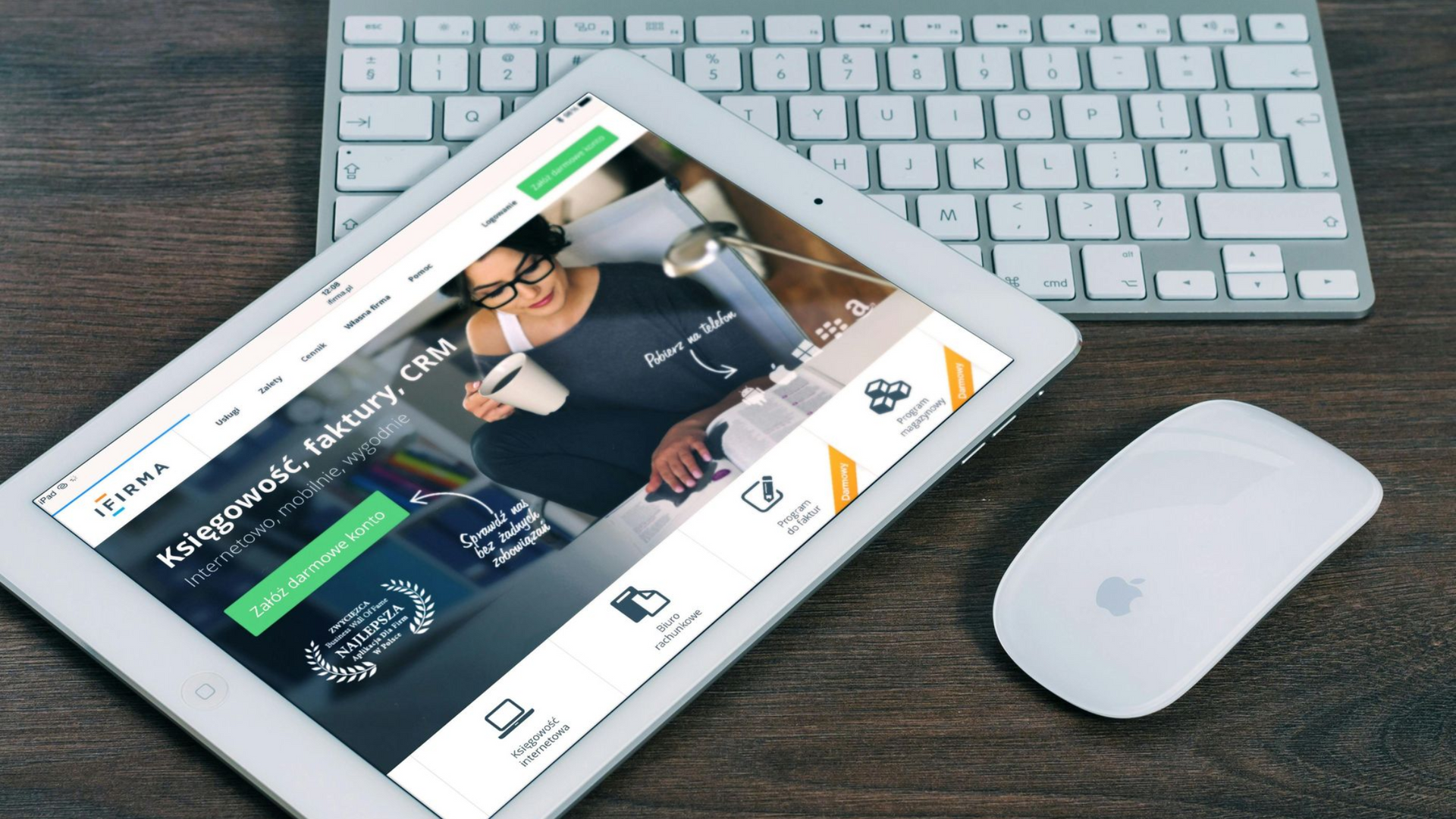 A group of three cell phones sitting on top of a table.