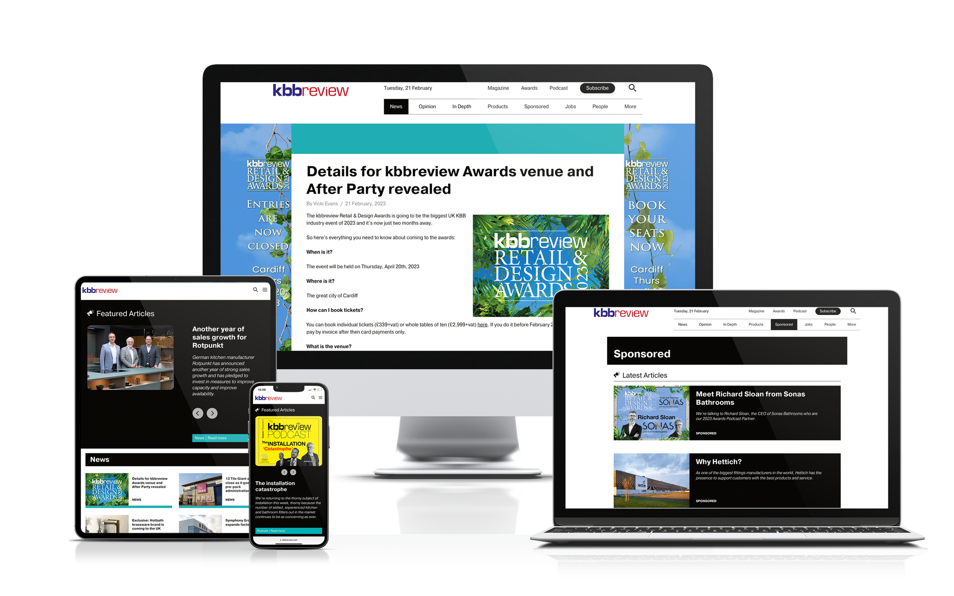 A computer , laptop , tablet , and phone are sitting on a table.