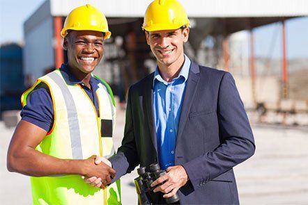 construction men shaking hands