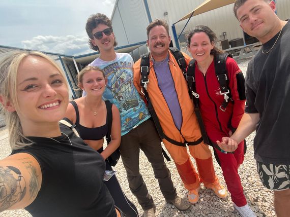 A group of people are posing for a picture together.