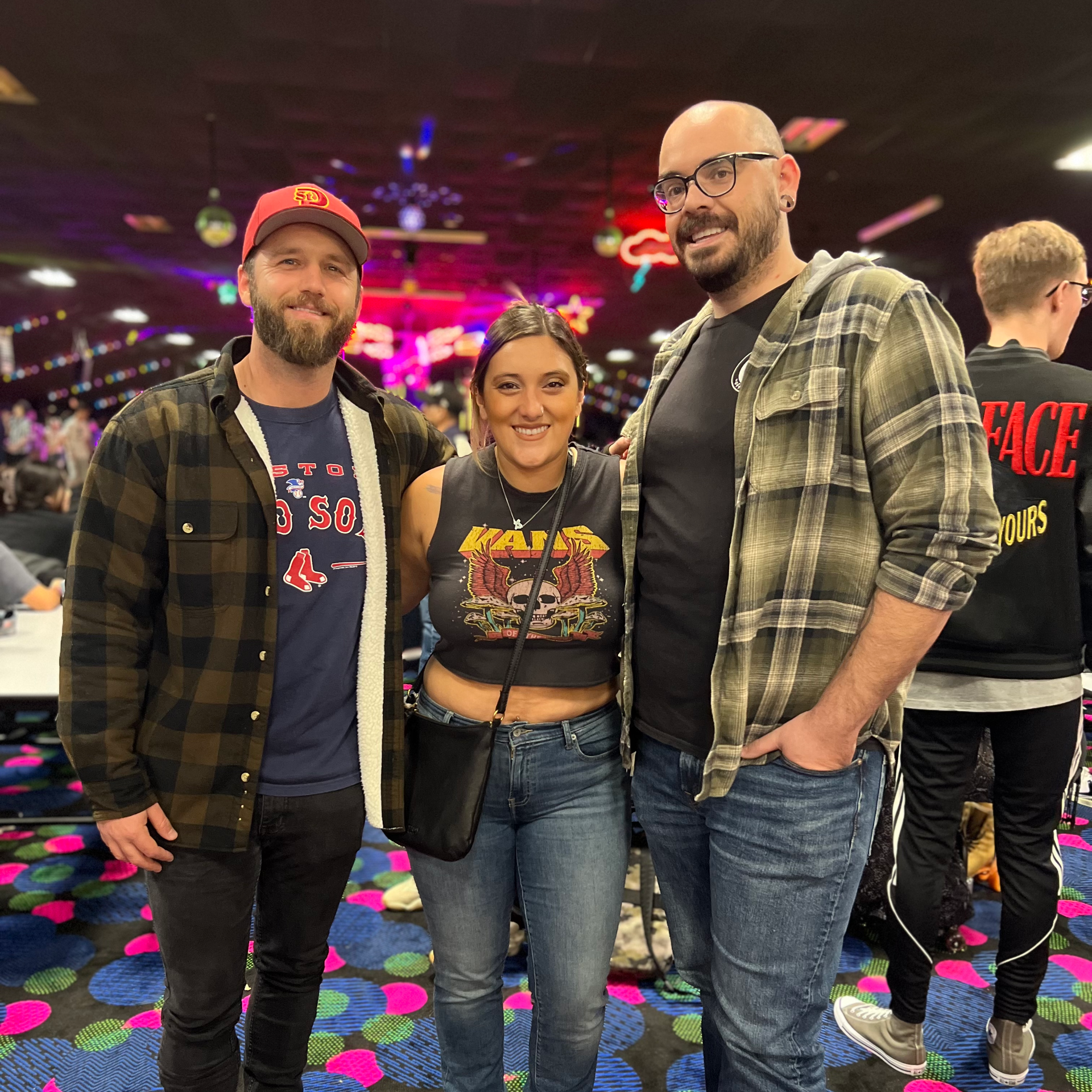 A group of people are posing for a picture in a casino.