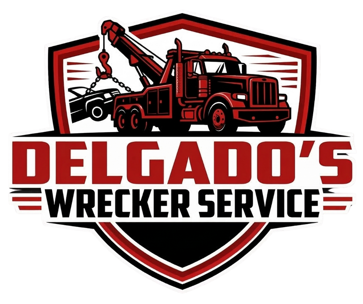 A logo for Delgado's Wrecker Service featuring a red tow truck inside a shield with the company name in bold text.