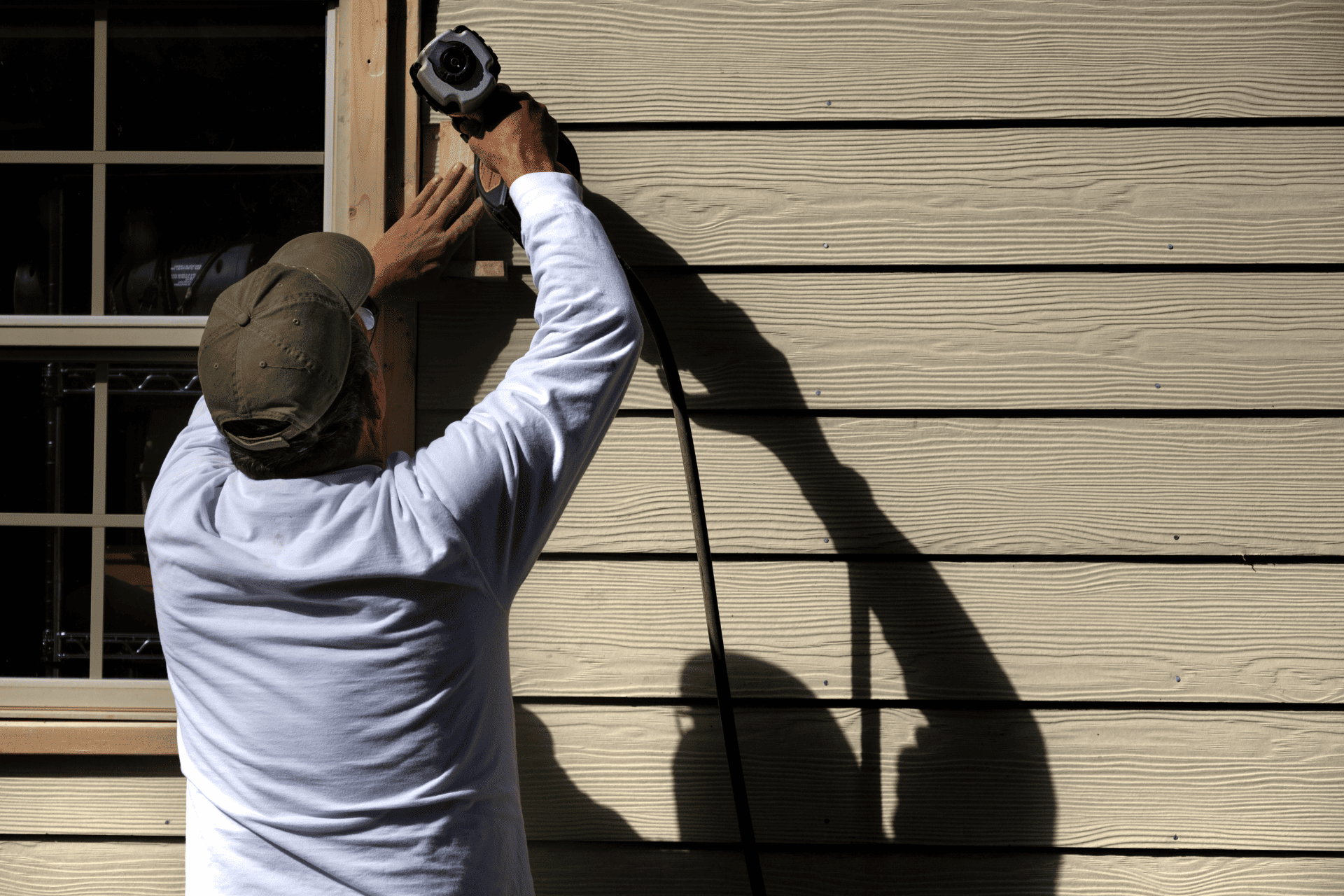 Professional Siding Contractor From Dallas Siding Pros Installing Siding On Dallas House 