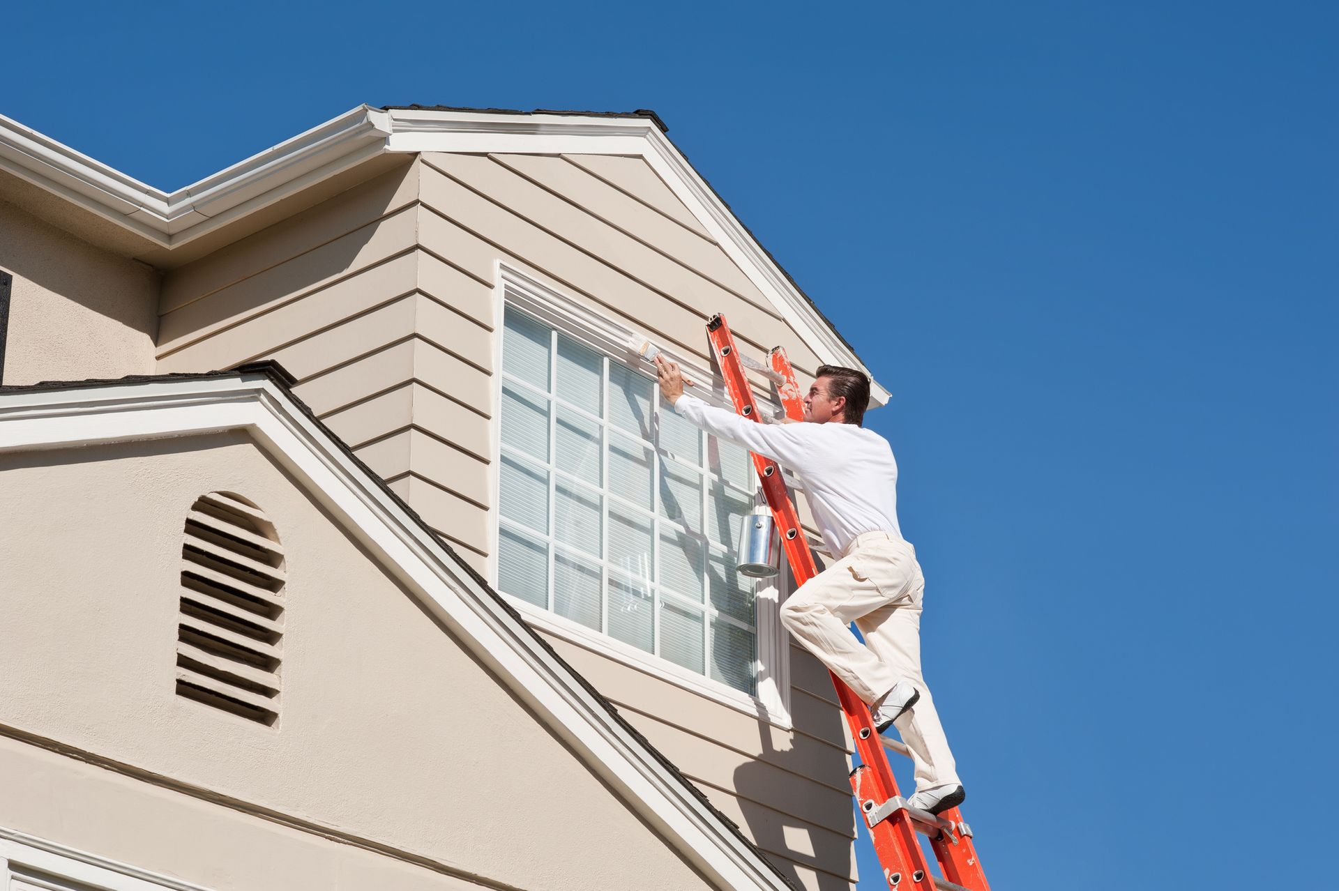 A Person Is Painting A Window | Waterbury, CT | Jhobany Construction LLC