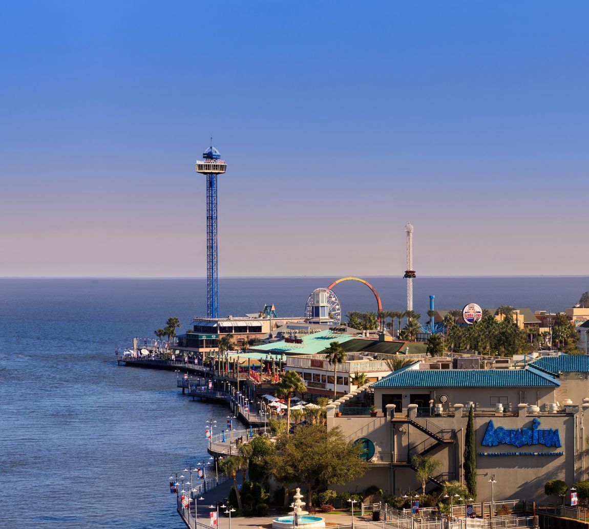 An aerial view of an Kemah Boardwalk amusement park on the bay water