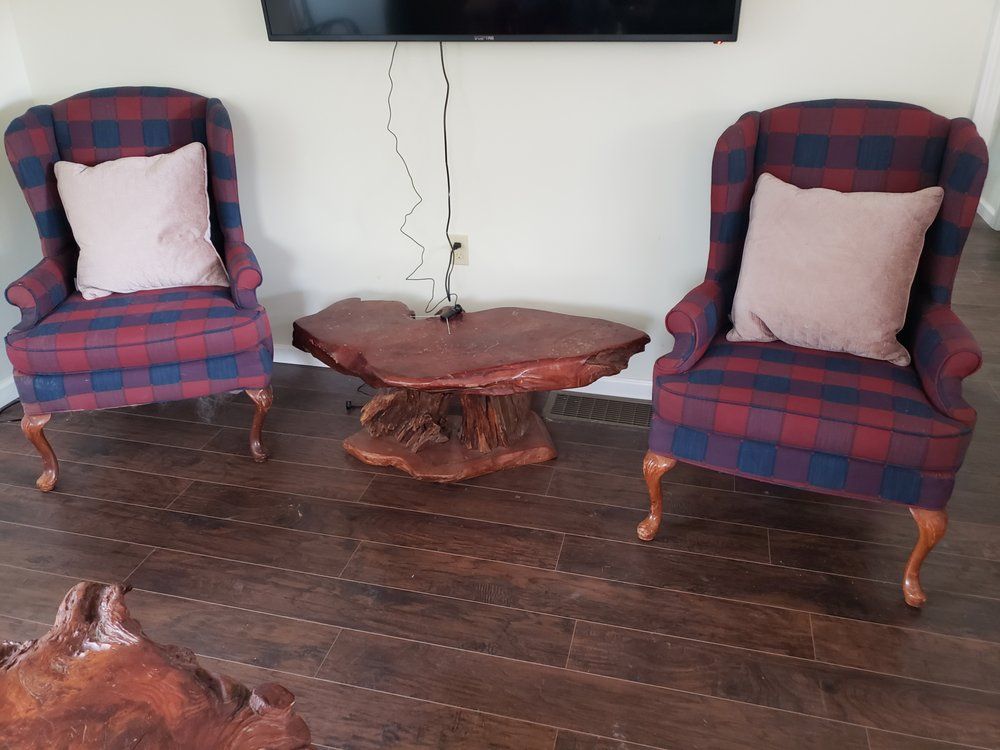 Two chairs and a coffee table in a living room