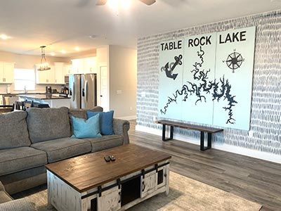 Table Rock Lake sign in the interior design of a living room in a vacation rental property