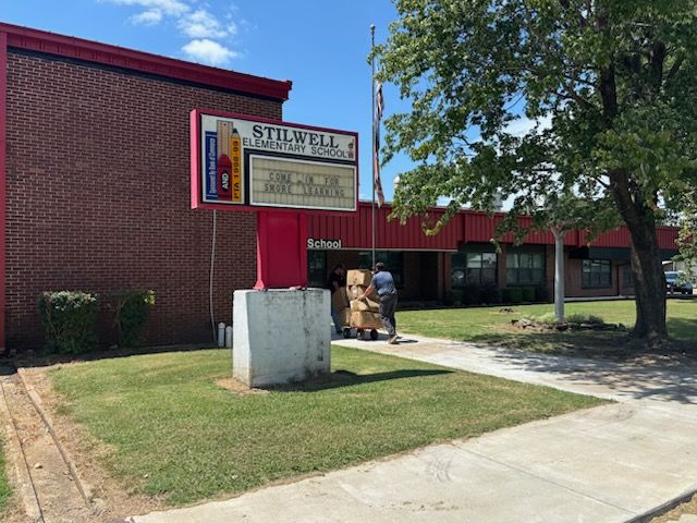 The shipment of backpacks Arriving at the school
