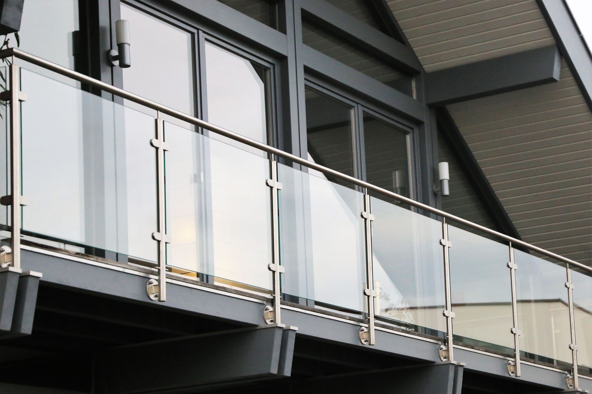 View of a balcony made of glass balustrade.