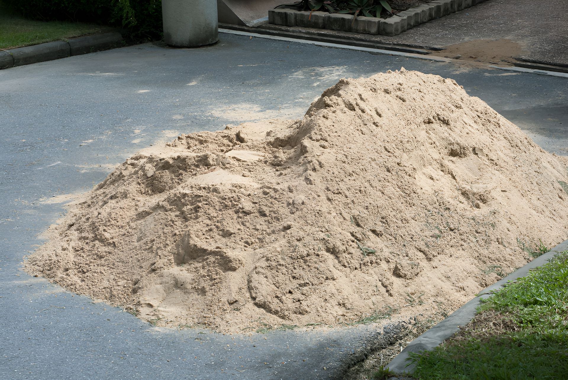 A Pile of Sand is Sitting on the Side of a Road — Frost 4 Sand In Umina, NSW