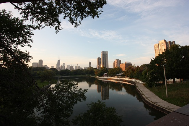 A lake with the chicago skyline in the background