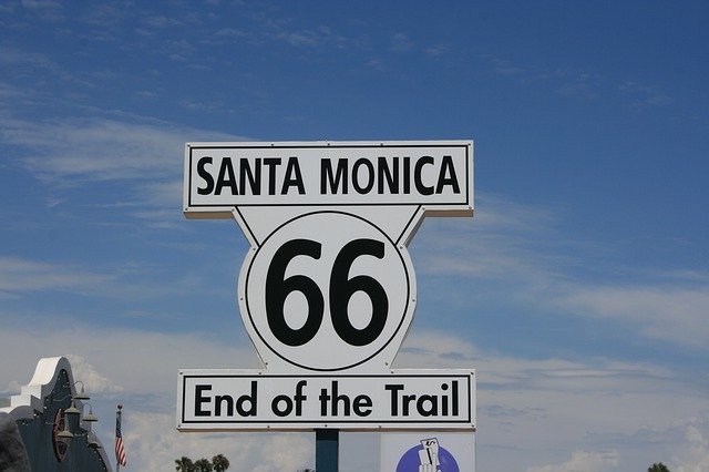 A sign that says santa monica 66 end of the trail