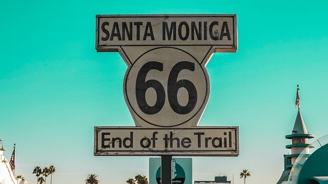A sign that says santa monica 66 end of the trail