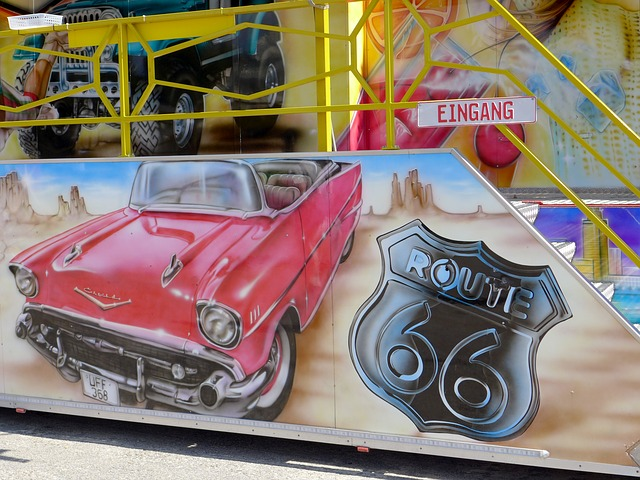 A painting of a red car and a route 66 sign in springfield, missouri