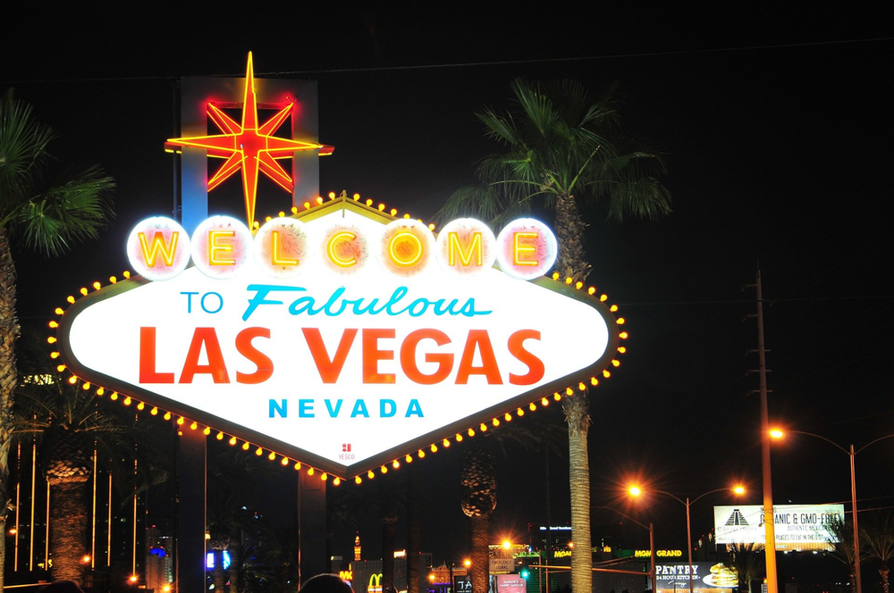 The Las Vegas sign is lit up at night