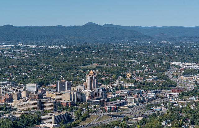 An aerial view of a city in the smoky mountains