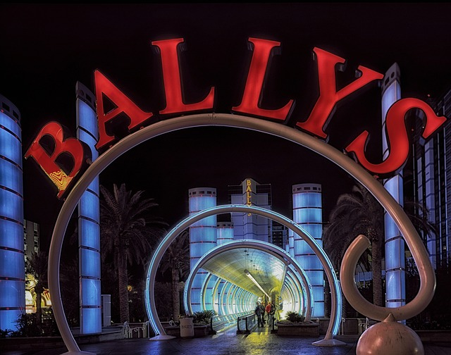 The entrance to bally 's is lit up at night