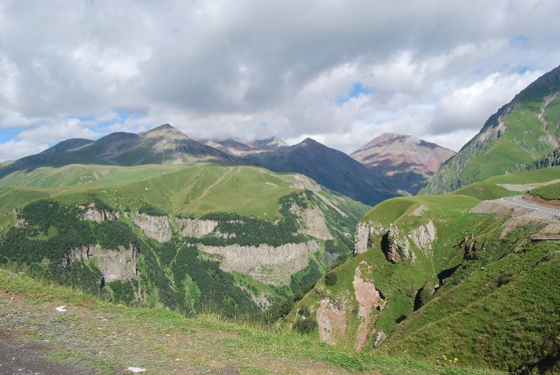 A mountain range with a road going through it in Georgia