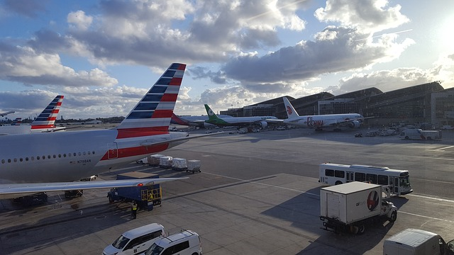 A large passenger jet is parked on the tarmac at an airport.