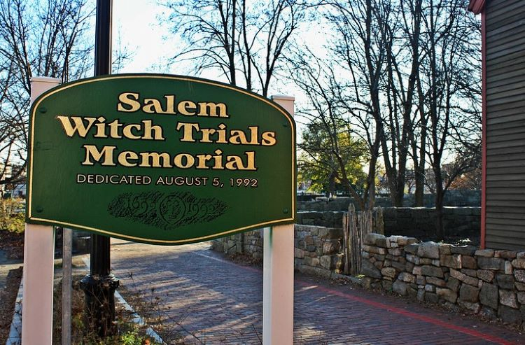 A sign for the salem witch trials memorial