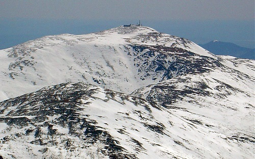 A snowy mountain in white mountain national forest