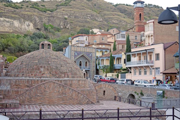 A city in georgia with a dome shaped building in the middle of it