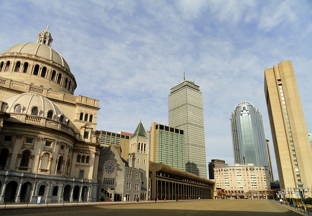 A large building with a dome in the middle of Boston