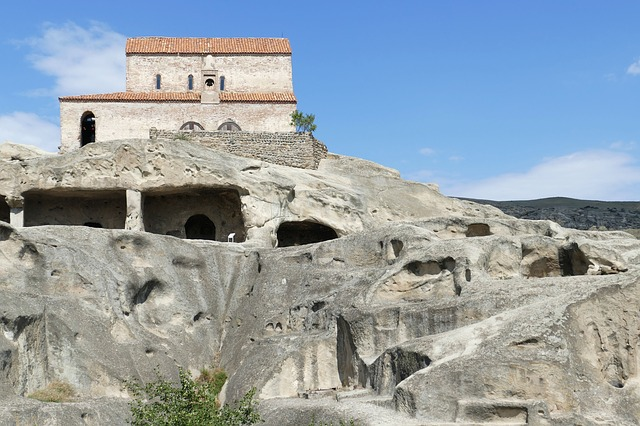 A building is sitting on top of a rocky hill in georgia