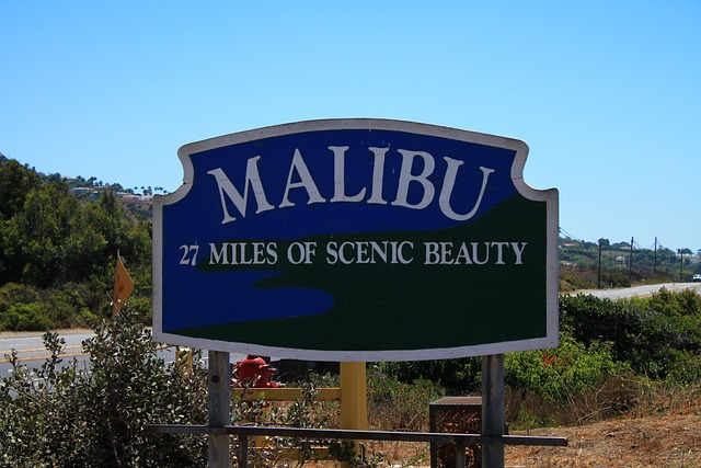 A sign that says Malibu 27 miles of scenic beauty